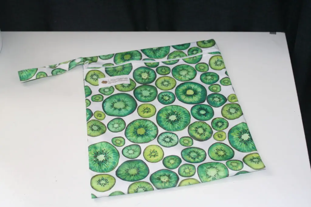 little genie nappies review image of green kiwi fruit wetbag